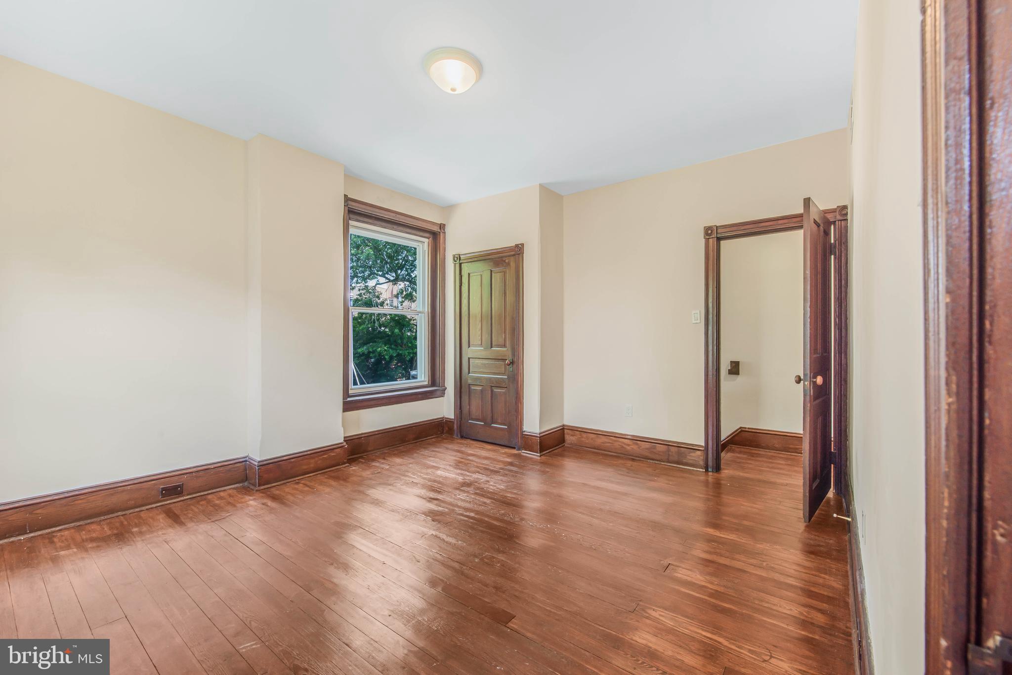 14 Simpson Road Ardmore, PA 19003 - Photo 46 of 58 an empty room with wooden floor and a window