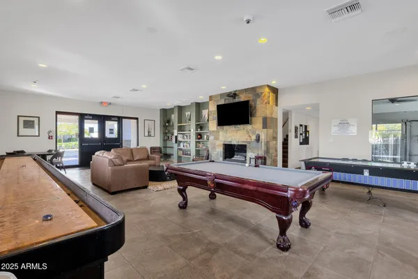 a very nice looking room with gym equipment