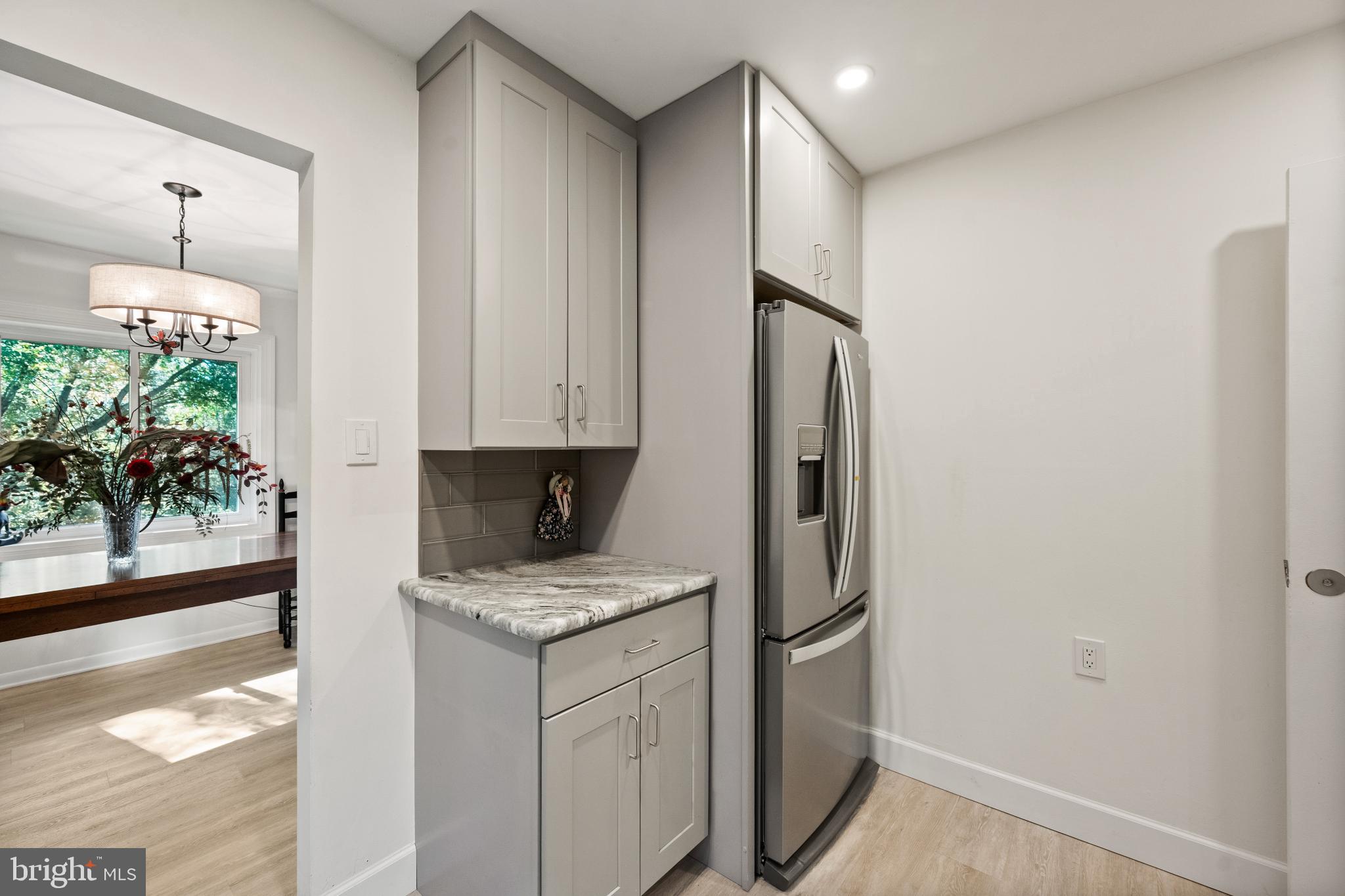 1408 Northgate Square, Unit 22B Reston, VA 20190 - Photo 3 of 23 Recently Renovated kitchen with sleek cabinetry.