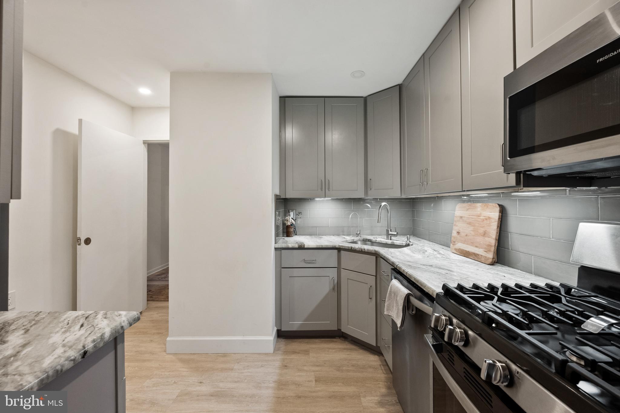 1408 Northgate Square, Unit 22B Reston, VA 20190 - Photo 4 of 23 Recently Renovated kitchen with updated appliances