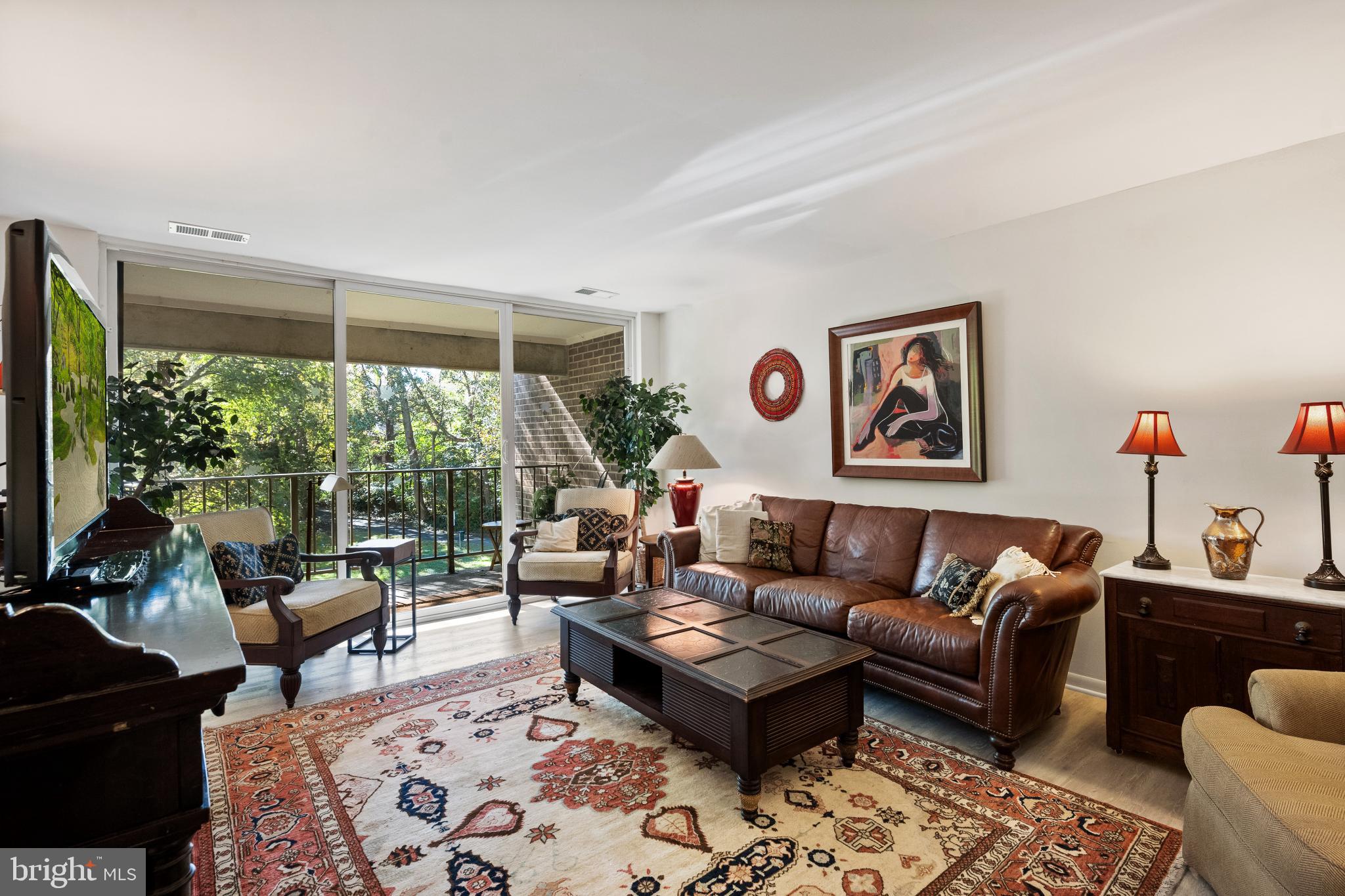 1408 Northgate Square, Unit 22B Reston, VA 20190 - Photo 6 of 23 Living Room opens to balcony