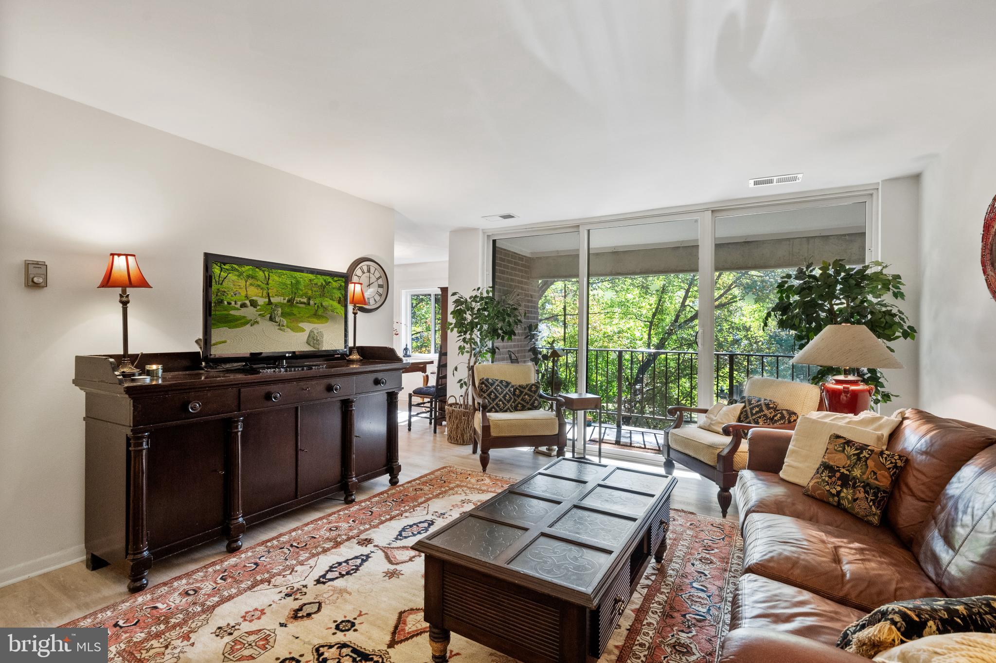 1408 Northgate Square, Unit 22B Reston, VA 20190 - Photo 7 of 23 Bright and inviting living room.