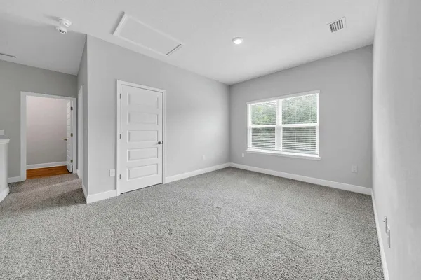 an empty room with windows