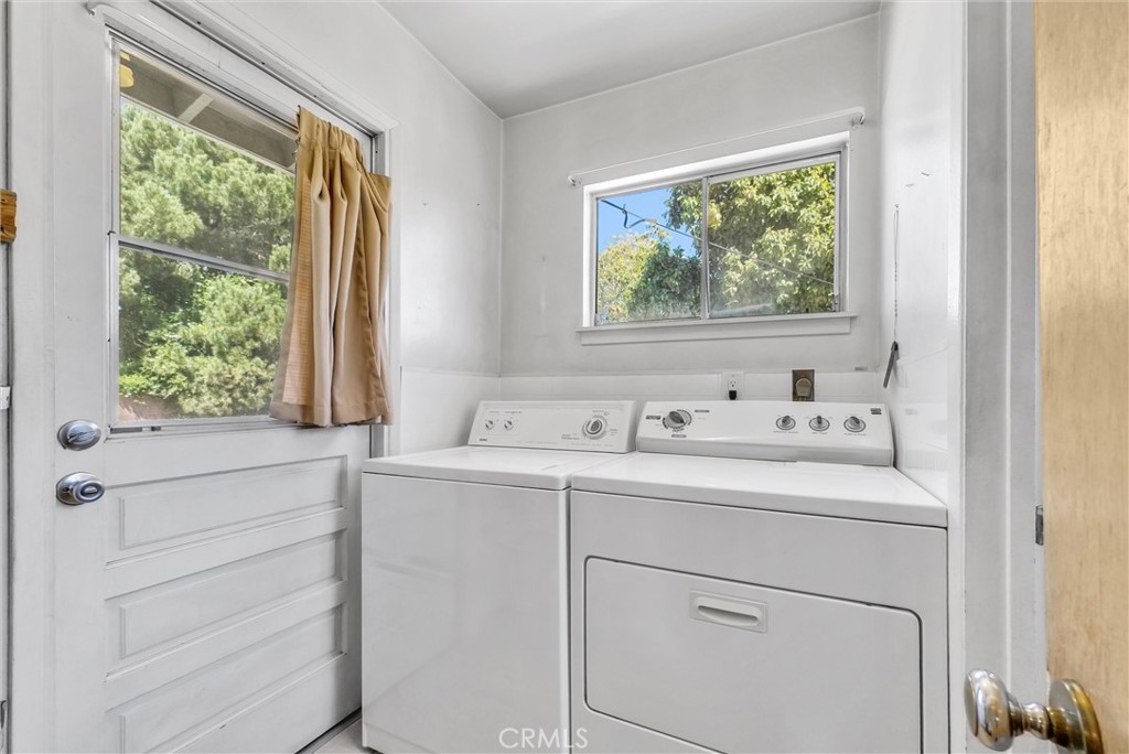 2551 Rome Avenue Anaheim, CA 92804 - Photo 13 of 27 a bathroom with a sink and a window