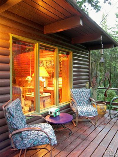 18325 Old Monte Rio Road Guerneville, CA 95446 - Photo 1 of 11 Front porch at dusk.