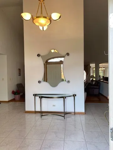 a kitchen with stainless steel appliances granite countertop a sink and a stove