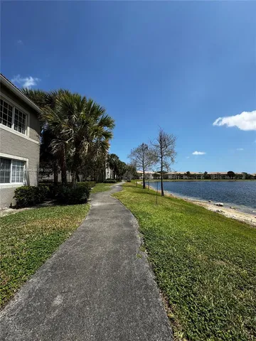 a view of a garden and basketball court