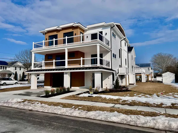 a front view of a building with a road
