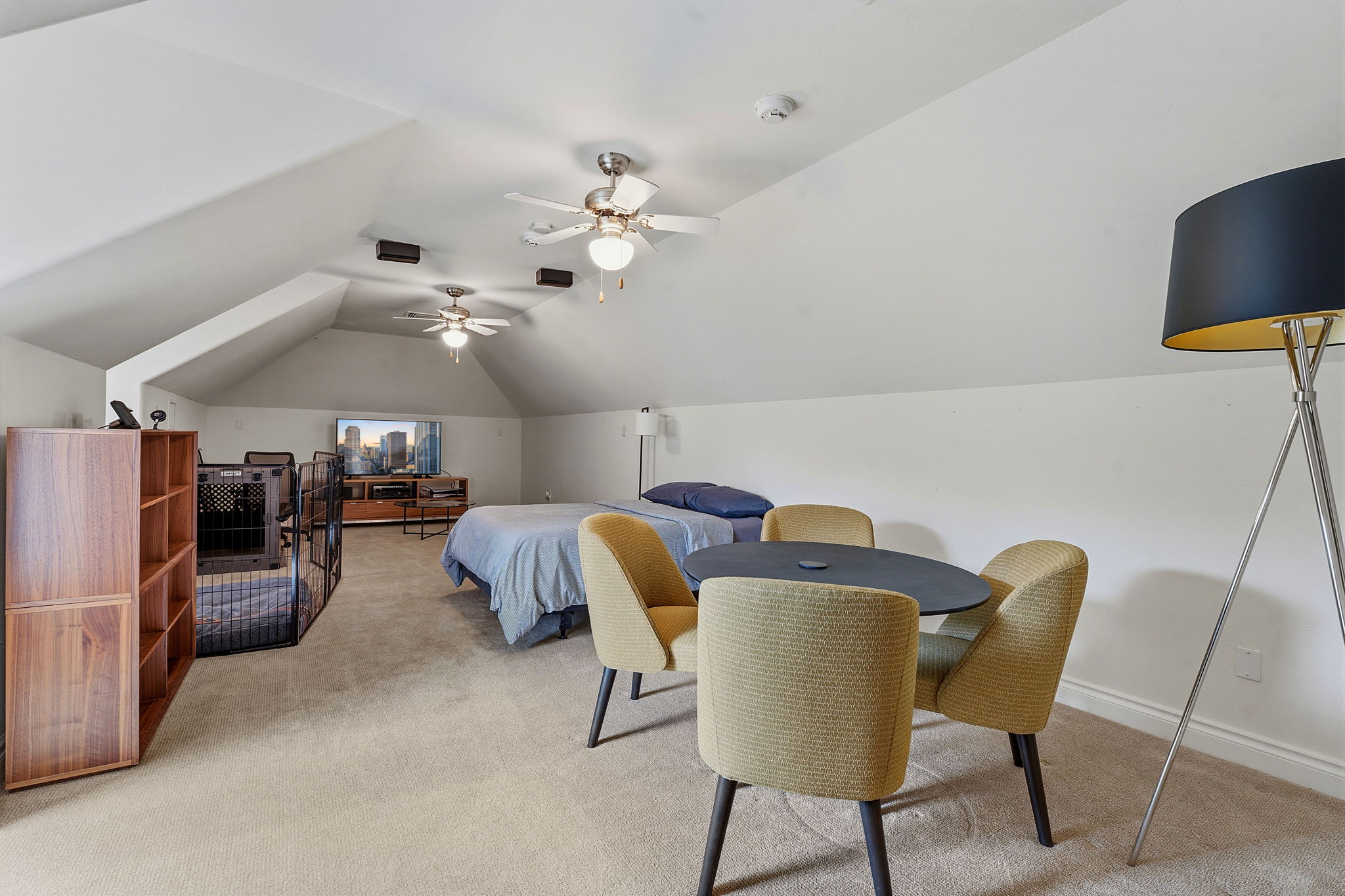 8121 Bluff Trail Austin, TX 78737 - Photo 21 of 40 Sloped ceilings and carpeted flooring define this inviting and versatile bonus room.
