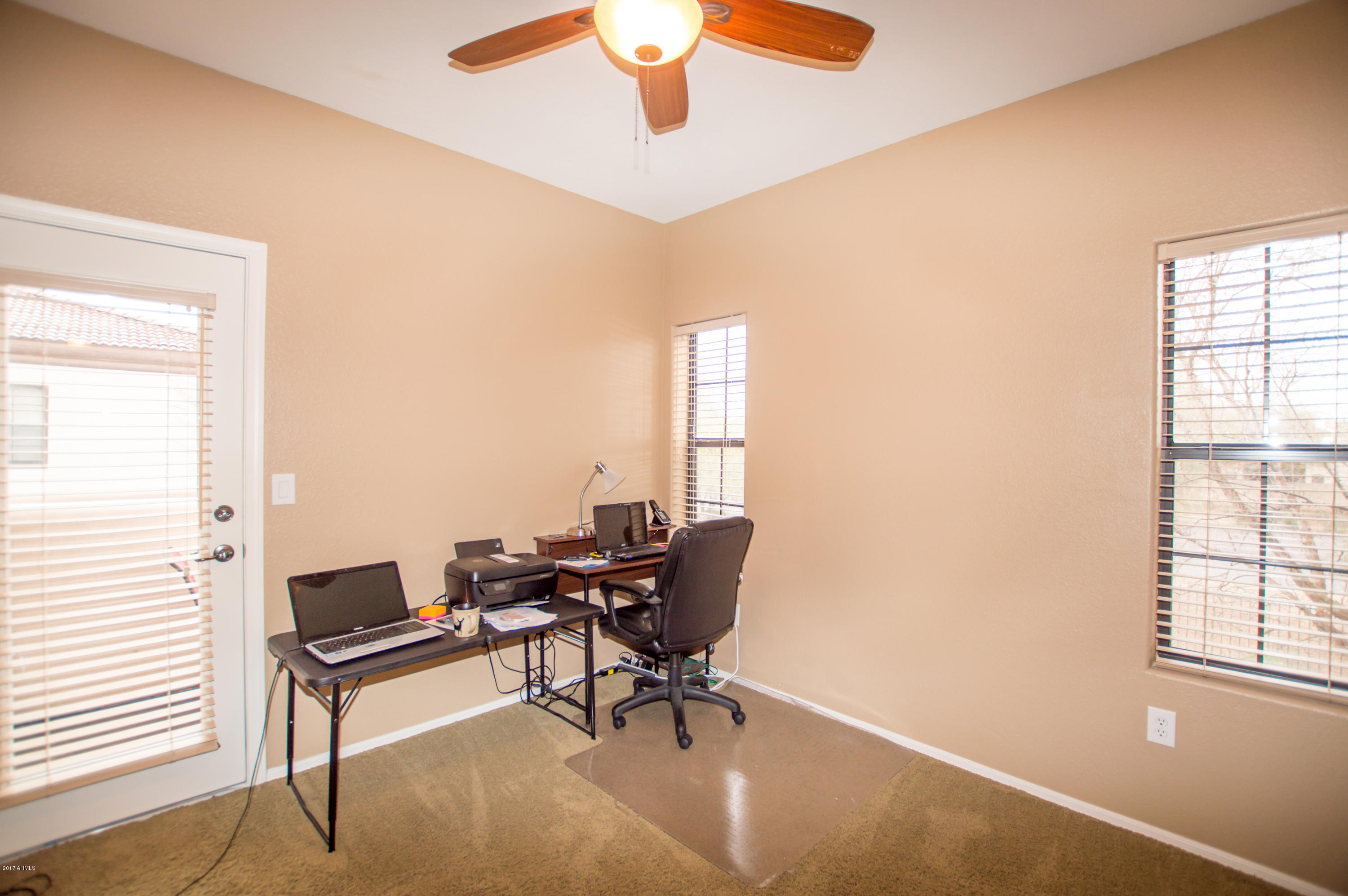 3150 East Beardsley Road, Unit 1016 Phoenix, AZ 85050 - Photo 14 of 25 a workspace with furniture and a window