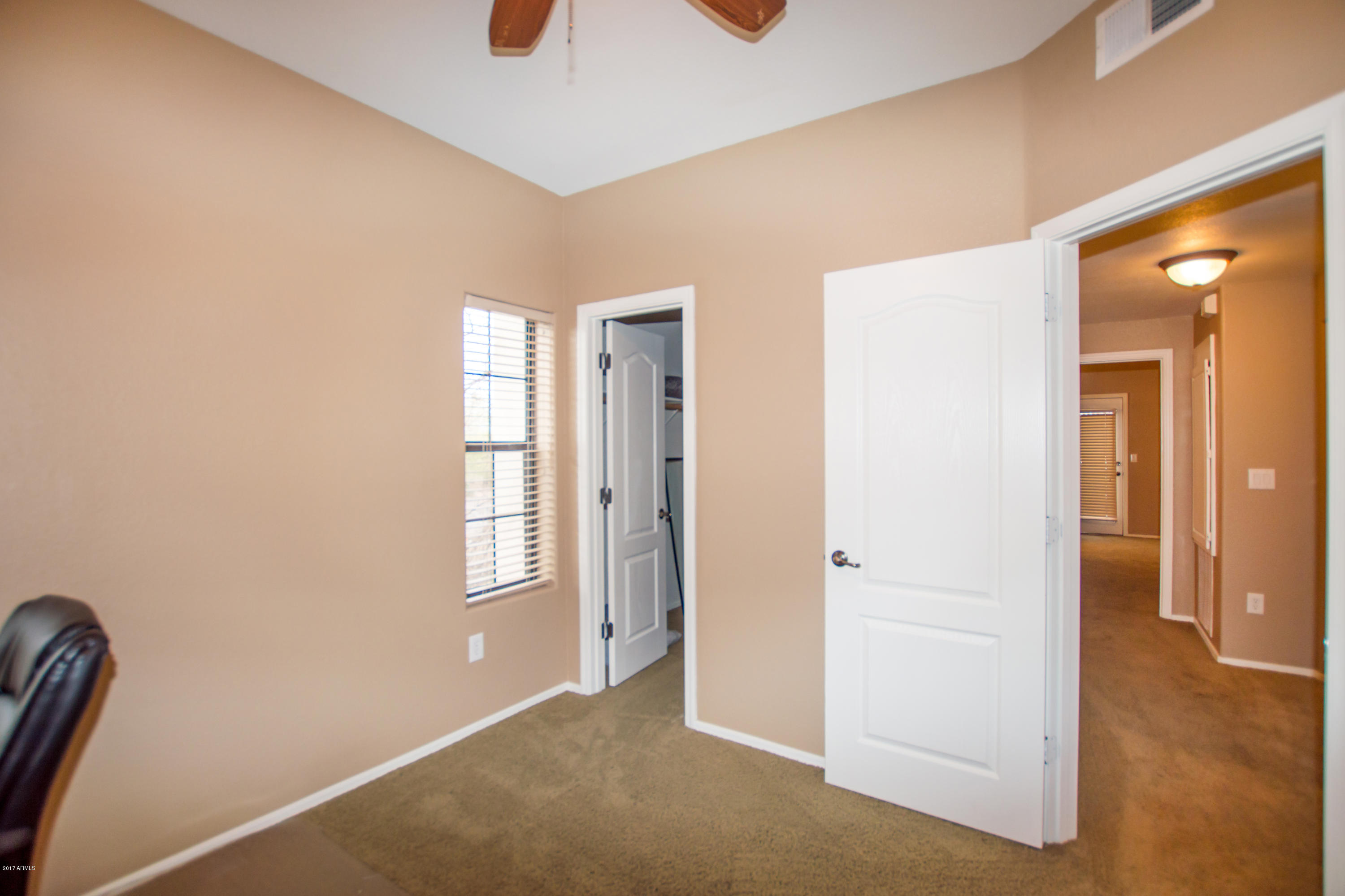 3150 East Beardsley Road, Unit 1016 Phoenix, AZ 85050 - Photo 15 of 25 wooden floor in an empty room