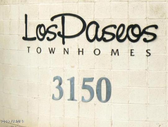 3150 East Beardsley Road, Unit 1016 Phoenix, AZ 85050 - Photo 24 of 25 a street sign that is on the wall