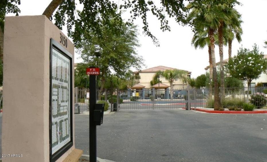 3150 East Beardsley Road, Unit 1016 Phoenix, AZ 85050 - Photo 25 of 25 a view of a street with palm trees