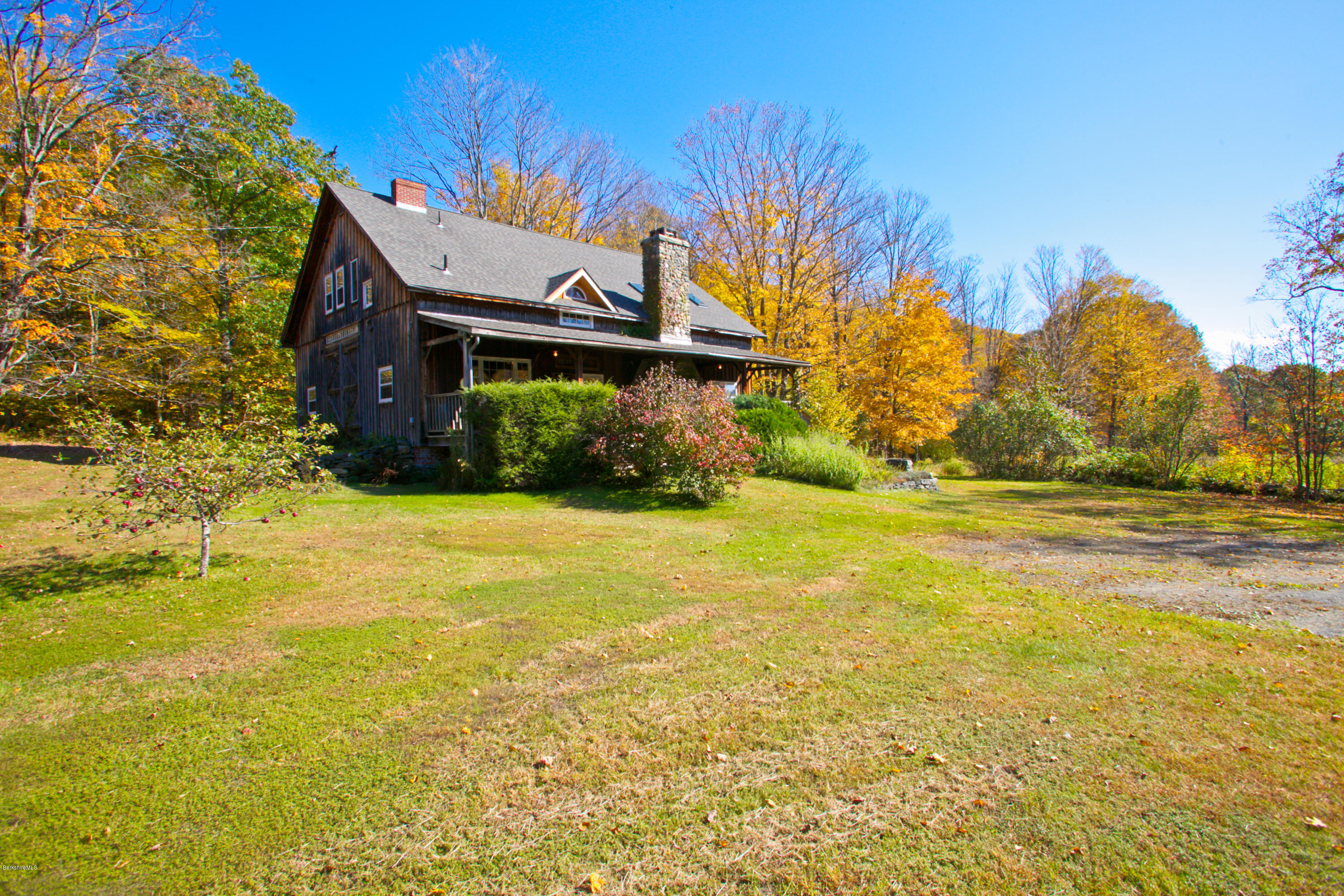11 Johnson Hill Road Chester, MA 01011 - Photo 2 of 46 a view of a house with a yard