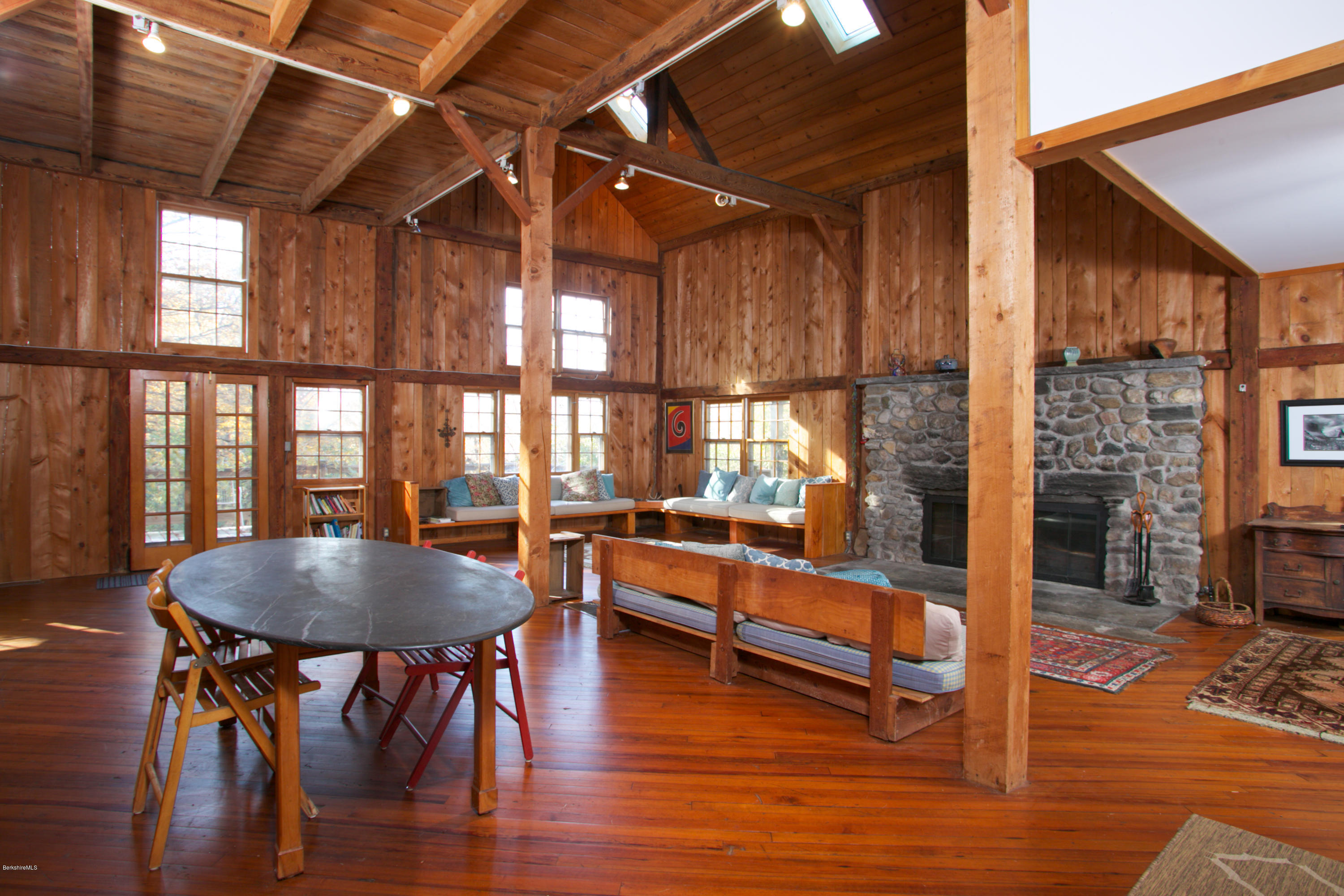11 Johnson Hill Road Chester, MA 01011 - Photo 22 of 46 a dining room with furniture and wooden floor