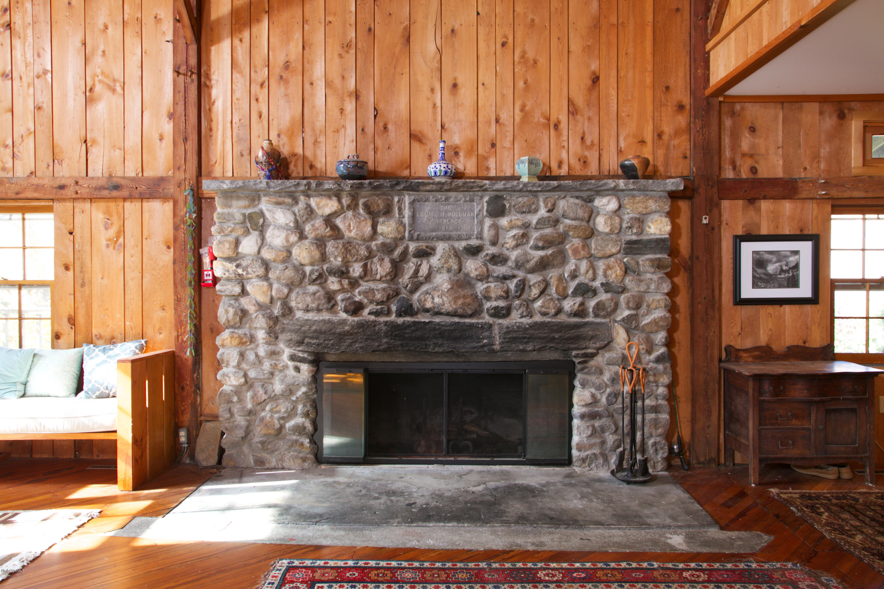 11 Johnson Hill Road Chester, MA 01011 - Photo 24 of 46 a view of a fireplace with wooden floor