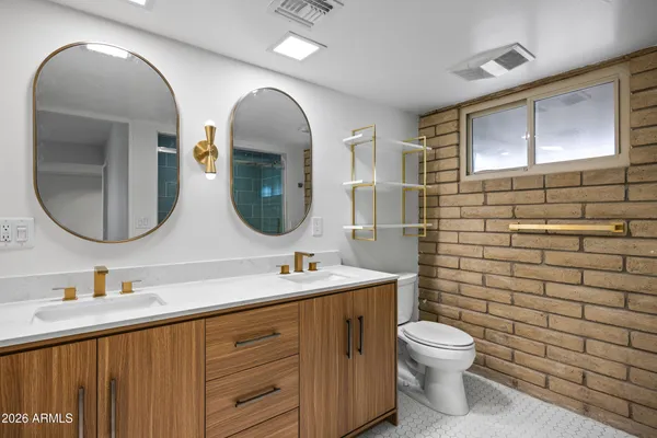 a bathroom with a shower and a toilet