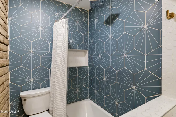 a view of a house with a yard and wooden floor