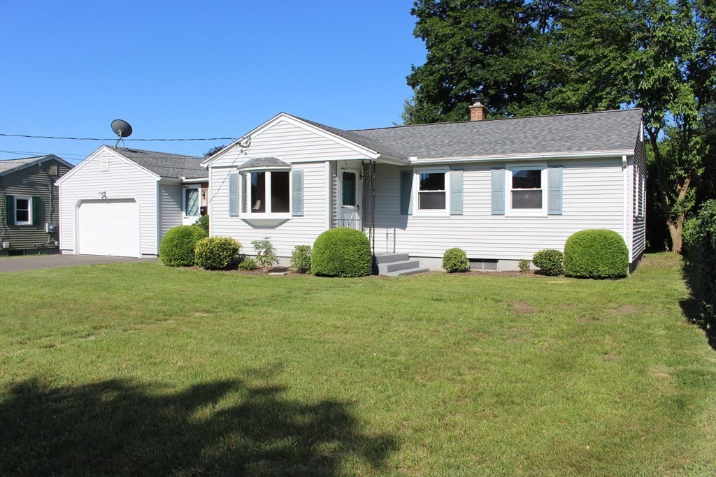32 Randall Street Chicopee, MA 01013 - Photo 1 of 28 a view of a house with a backyard