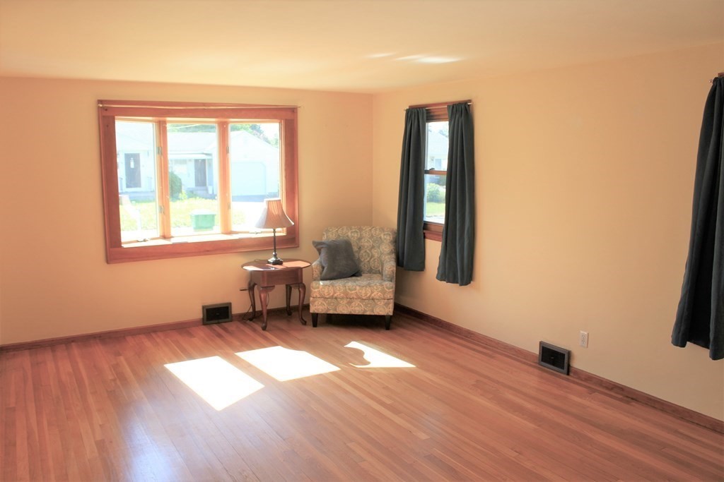 32 Randall Street Chicopee, MA 01013 - Photo 11 of 28 a living room with furniture and a window