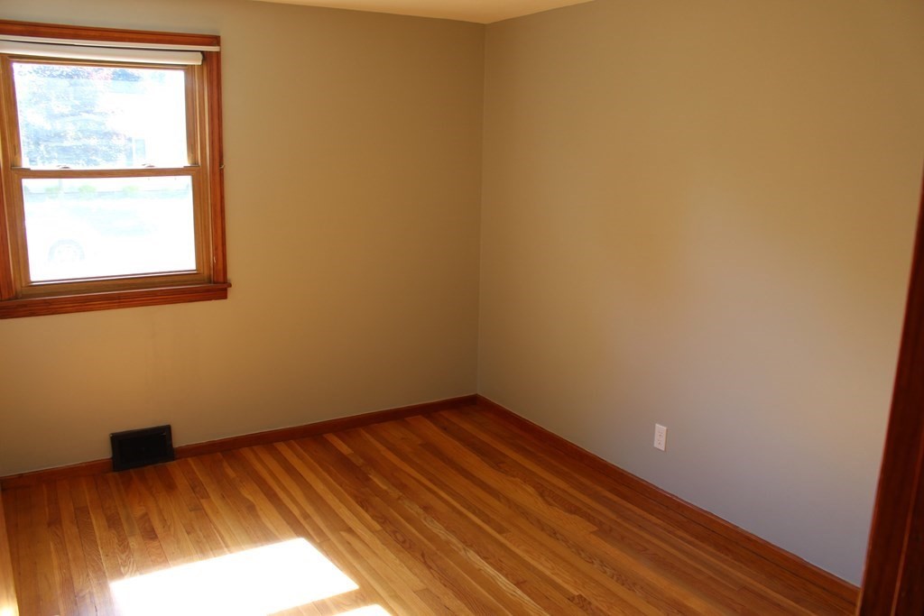 32 Randall Street Chicopee, MA 01013 - Photo 13 of 28 a view of an empty room and window