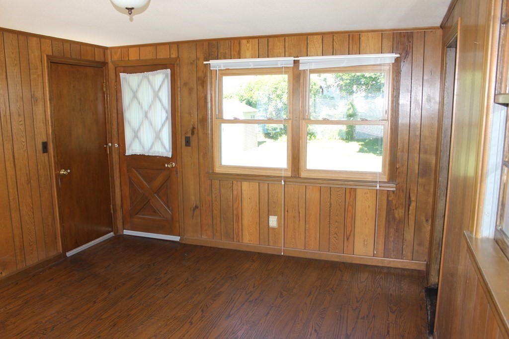 32 Randall Street Chicopee, MA 01013 - Photo 24 of 28 an empty room with wooden floor and windows