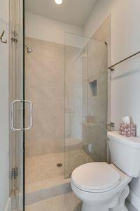 7 Grande Pointe Dr Inlet Beach Inlet Beach, FL 32461 - Photo 16 of 61 a white toilet sitting next to a bathroom