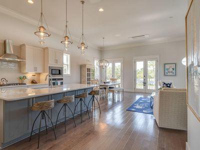 7 Grande Pointe Dr Inlet Beach Inlet Beach, FL 32461 - Photo 21 of 61 a large kitchen with a table and chairs
