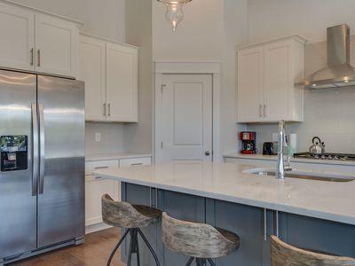 7 Grande Pointe Dr Inlet Beach Inlet Beach, FL 32461 - Photo 25 of 61 a kitchen with stainless steel appliances a sink a stove and a refrigerator