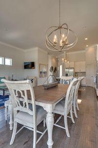 7 Grande Pointe Dr Inlet Beach Inlet Beach, FL 32461 - Photo 33 of 61 a view of a dining room with furniture and chandelier