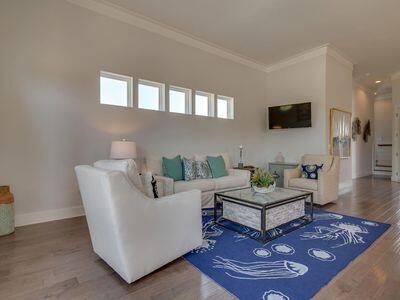 7 Grande Pointe Dr Inlet Beach Inlet Beach, FL 32461 - Photo 36 of 61 a living room with furniture and a flat screen tv