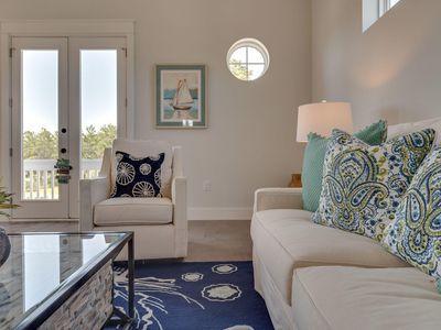 7 Grande Pointe Dr Inlet Beach Inlet Beach, FL 32461 - Photo 39 of 61 a living room with furniture and a large window