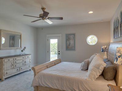 7 Grande Pointe Dr Inlet Beach Inlet Beach, FL 32461 - Photo 50 of 61 a bedroom with a large bed and a chandelier