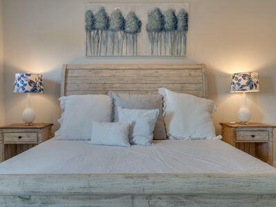 7 Grande Pointe Dr Inlet Beach Inlet Beach, FL 32461 - Photo 53 of 61 a bedroom with a bed and a fireplace