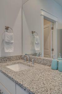 7 Grande Pointe Dr Inlet Beach Inlet Beach, FL 32461 - Photo 56 of 61 a bathroom with a granite countertop sink and a mirror