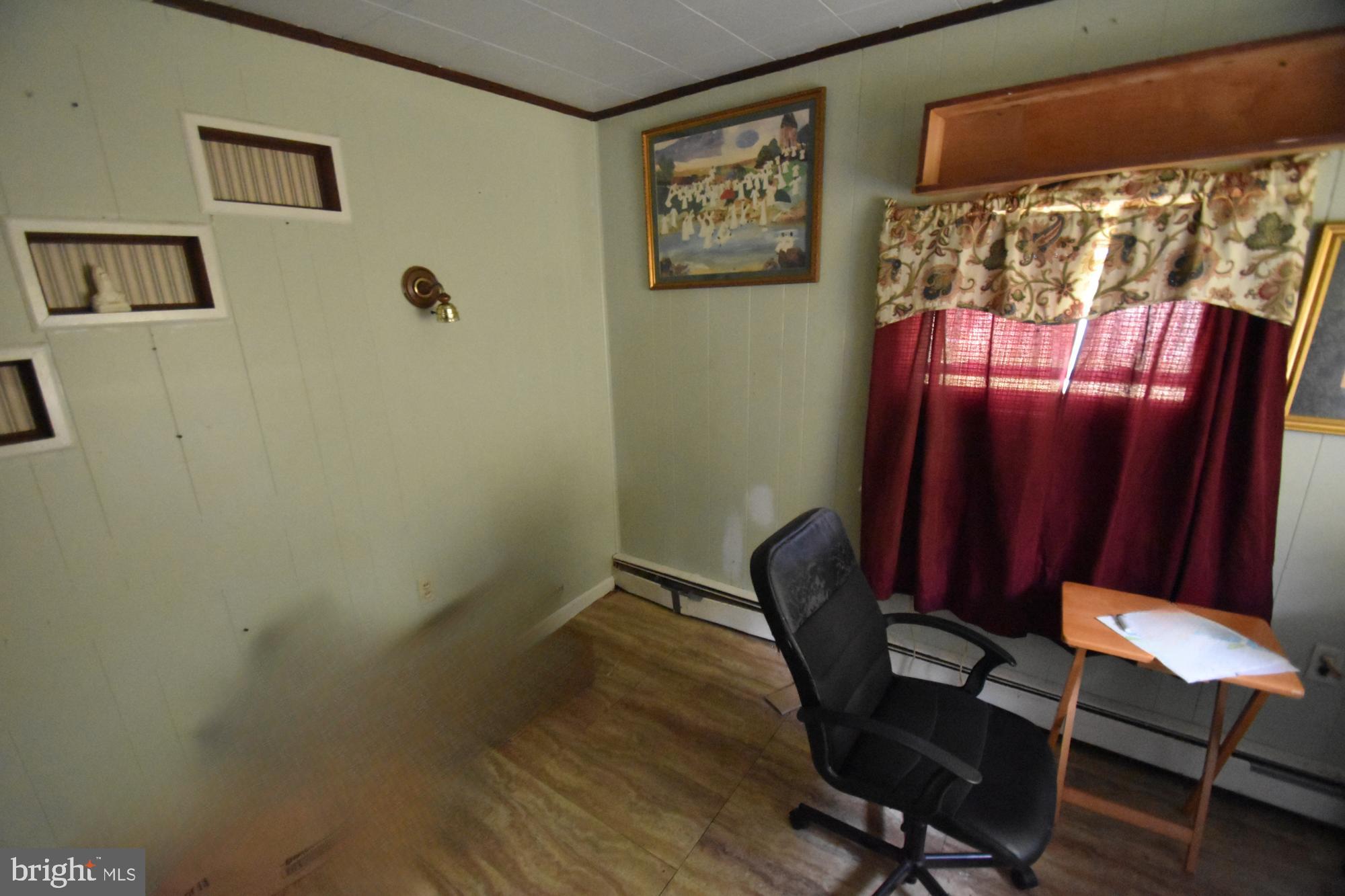 2038 Marsh Road Wilmington, DE 19810 - Photo 21 of 53 a view of a workspace with furniture and a window