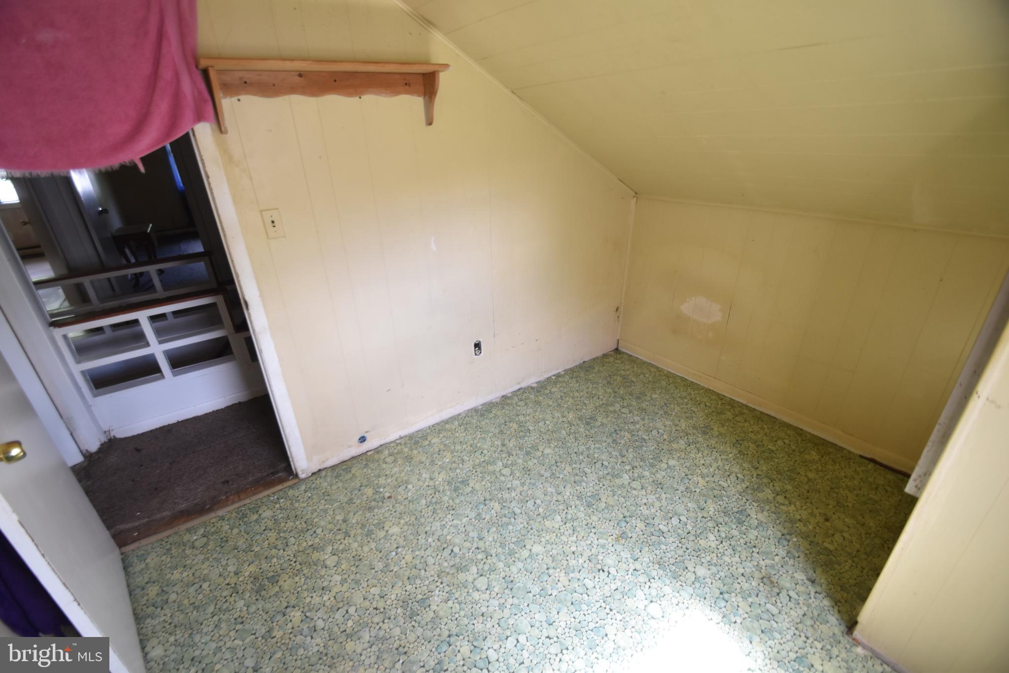 2038 Marsh Road Wilmington, DE 19810 - Photo 24 of 53 a view of an empty room with wooden floor