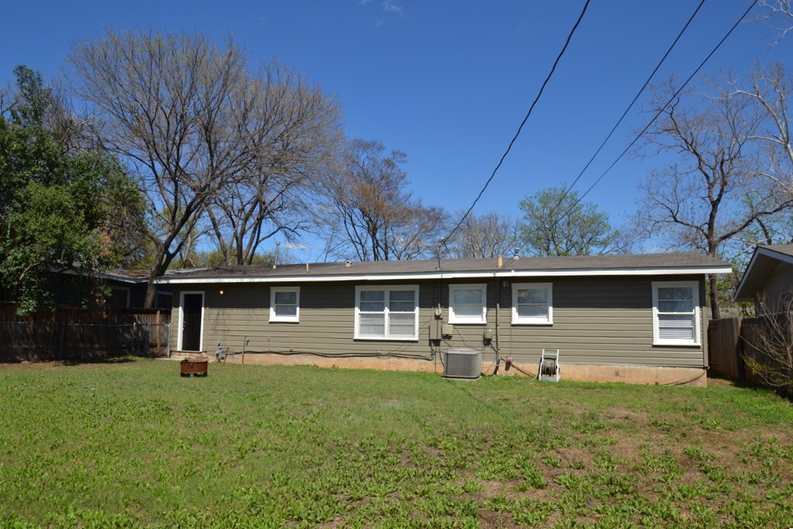 1211 Ridgemont Drive Austin, TX 78723 - Photo 26 of 28 a front view of house with yard