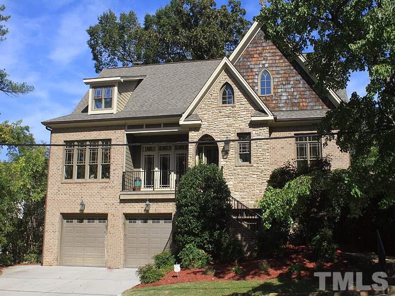 1405 Jarvis Street Raleigh, NC 27608 - Photo 1 of 25 a view of a house with a yard