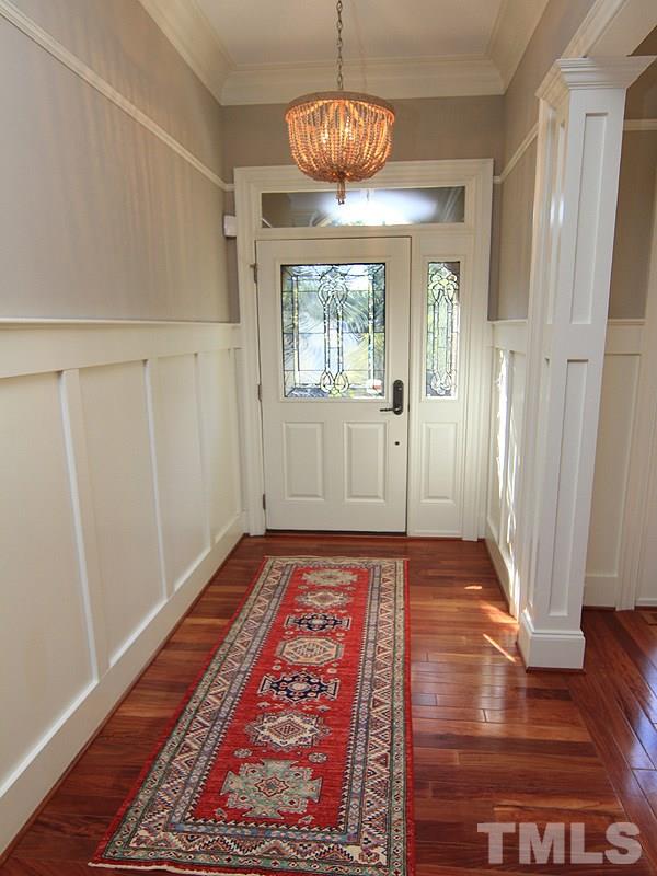 1405 Jarvis Street Raleigh, NC 27608 - Photo 3 of 25 wooden floor in an empty room with a window