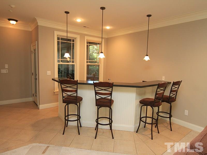 1405 Jarvis Street Raleigh, NC 27608 - Photo 21 of 25 a view of a kitchen with furniture and floor to ceiling window