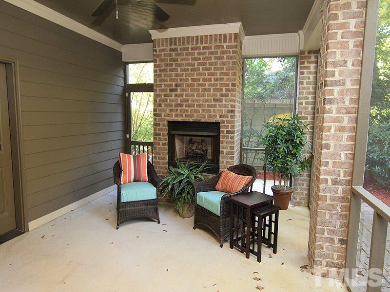 1405 Jarvis Street Raleigh, NC 27608 - Photo 23 of 25 a outdoor space with patio fireplace and a couch