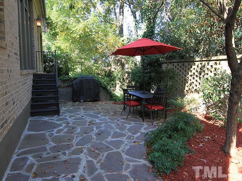 1405 Jarvis Street Raleigh, NC 27608 - Photo 25 of 25 a view of a patio with chairs and a yard