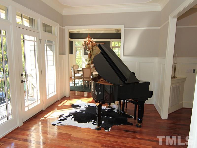 1405 Jarvis Street Raleigh, NC 27608 - Photo 4 of 25 a living room with wooden floor and furniture