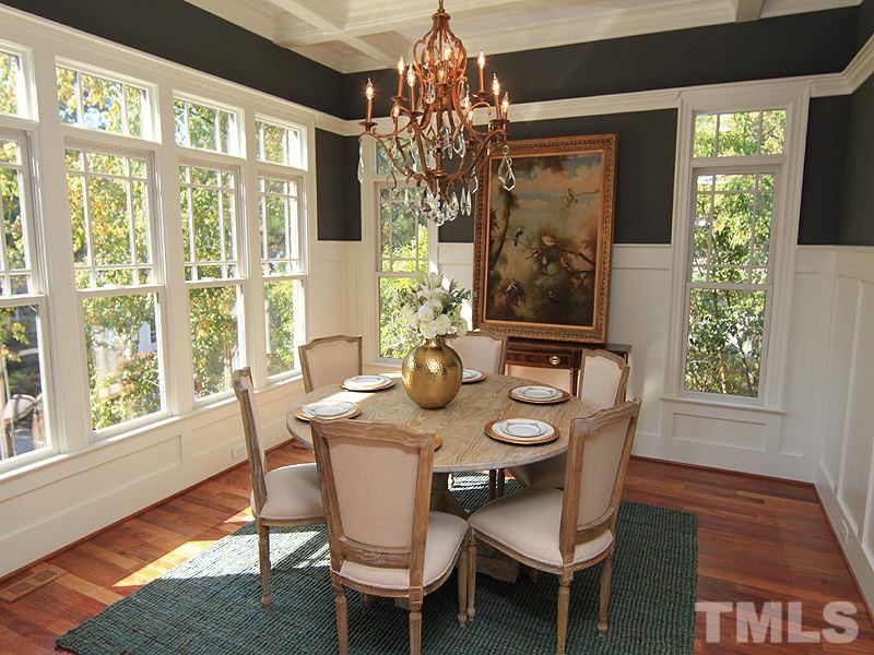 1405 Jarvis Street Raleigh, NC 27608 - Photo 5 of 25 a view of a dining room with furniture window and outside view