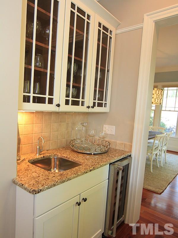 1405 Jarvis Street Raleigh, NC 27608 - Photo 10 of 25 a kitchen with a sink and a window