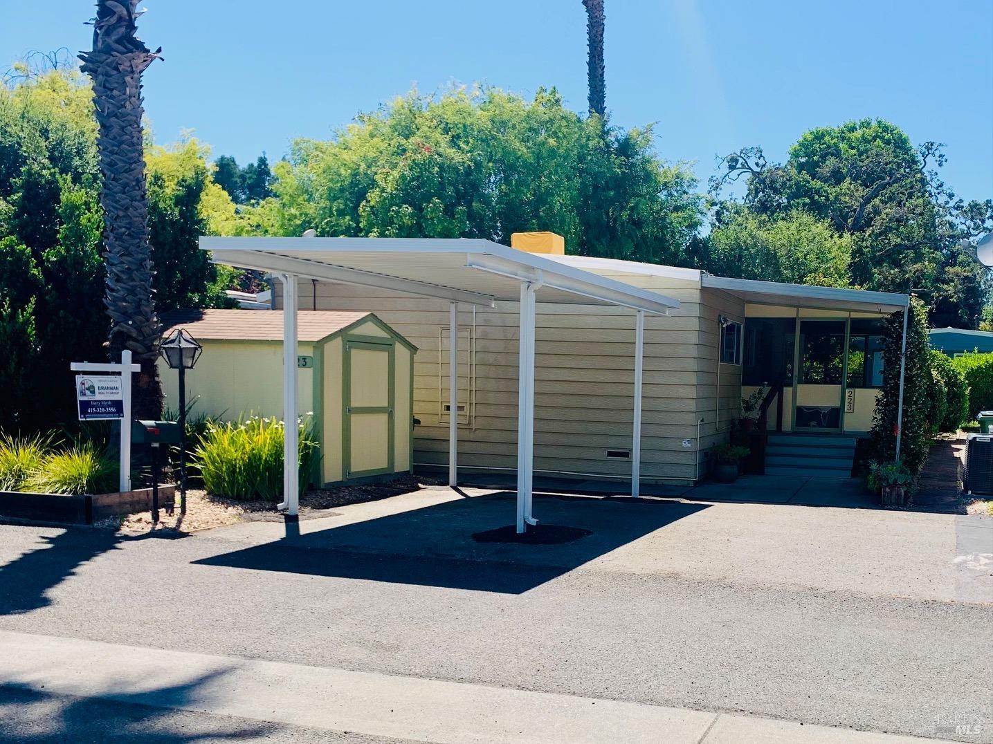 223 Barcelona Drive Novato, CA 94949 - Photo 1 of 1 a front view of a house with garden