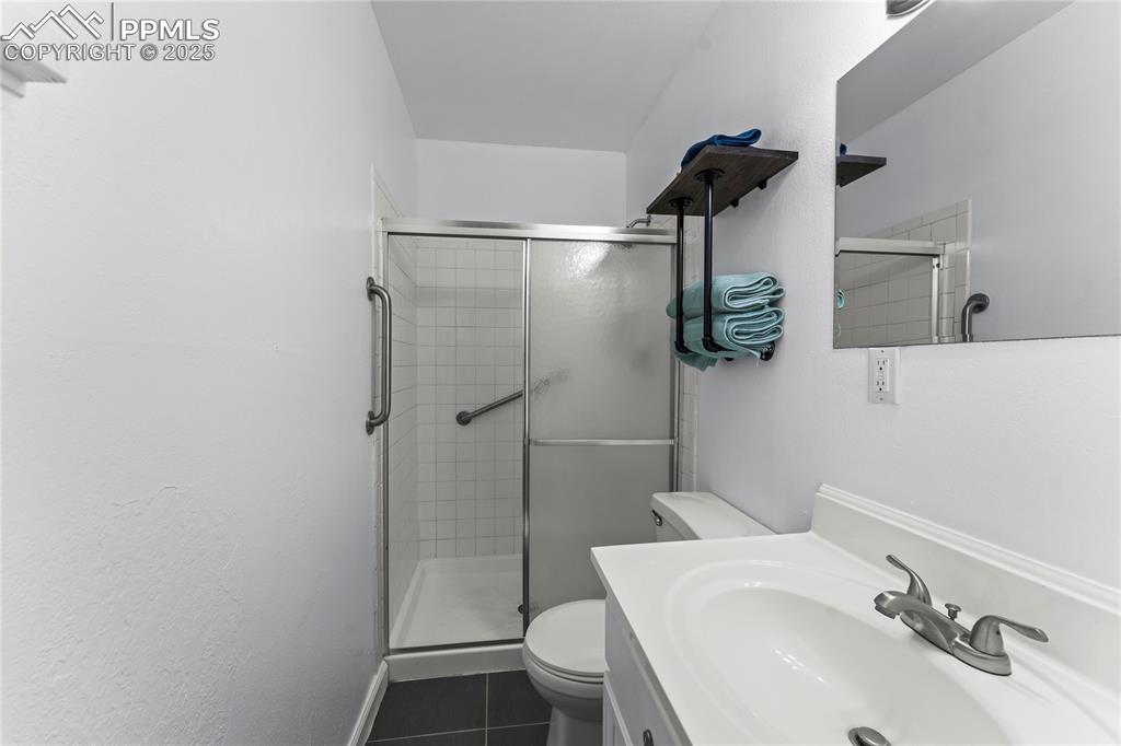 526 Griffith Way Colorado Springs, CO 80911 - Photo 20 of 46 a bathroom with a sink and toilet