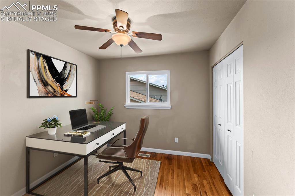 526 Griffith Way Colorado Springs, CO 80911 - Photo 21 of 46 a workspace with furniture and window