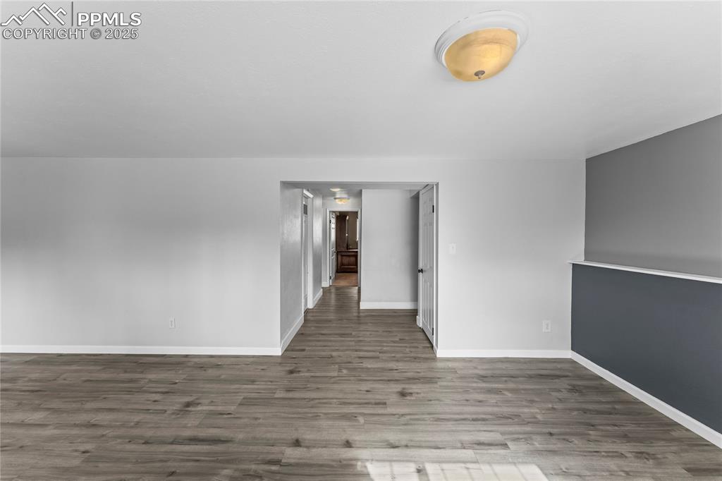 526 Griffith Way Colorado Springs, CO 80911 - Photo 30 of 46 a view of a room with wooden floor